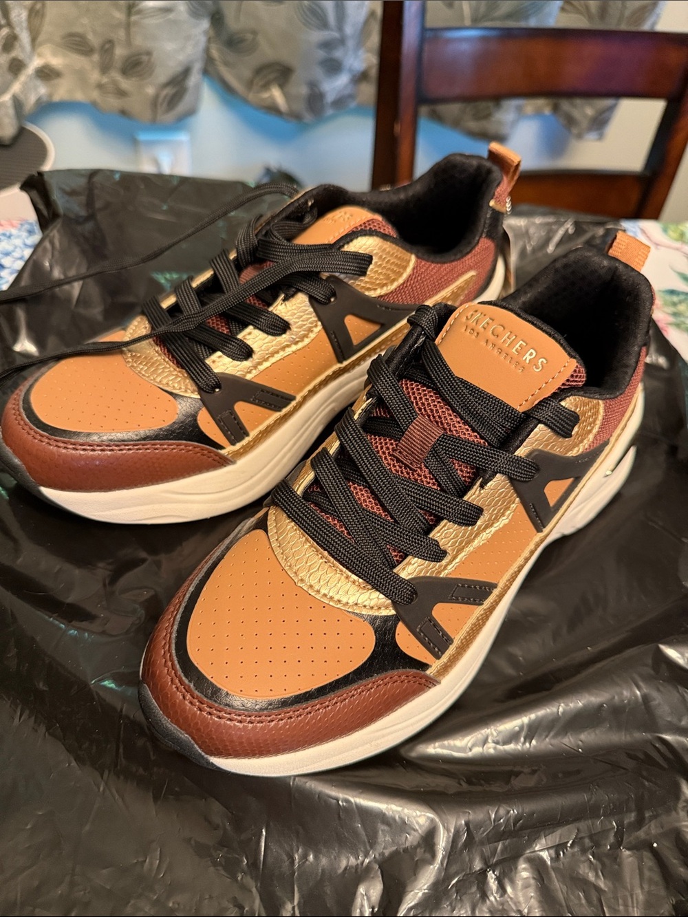 Skechers women’s Sneakers in Brown, Tan and Black